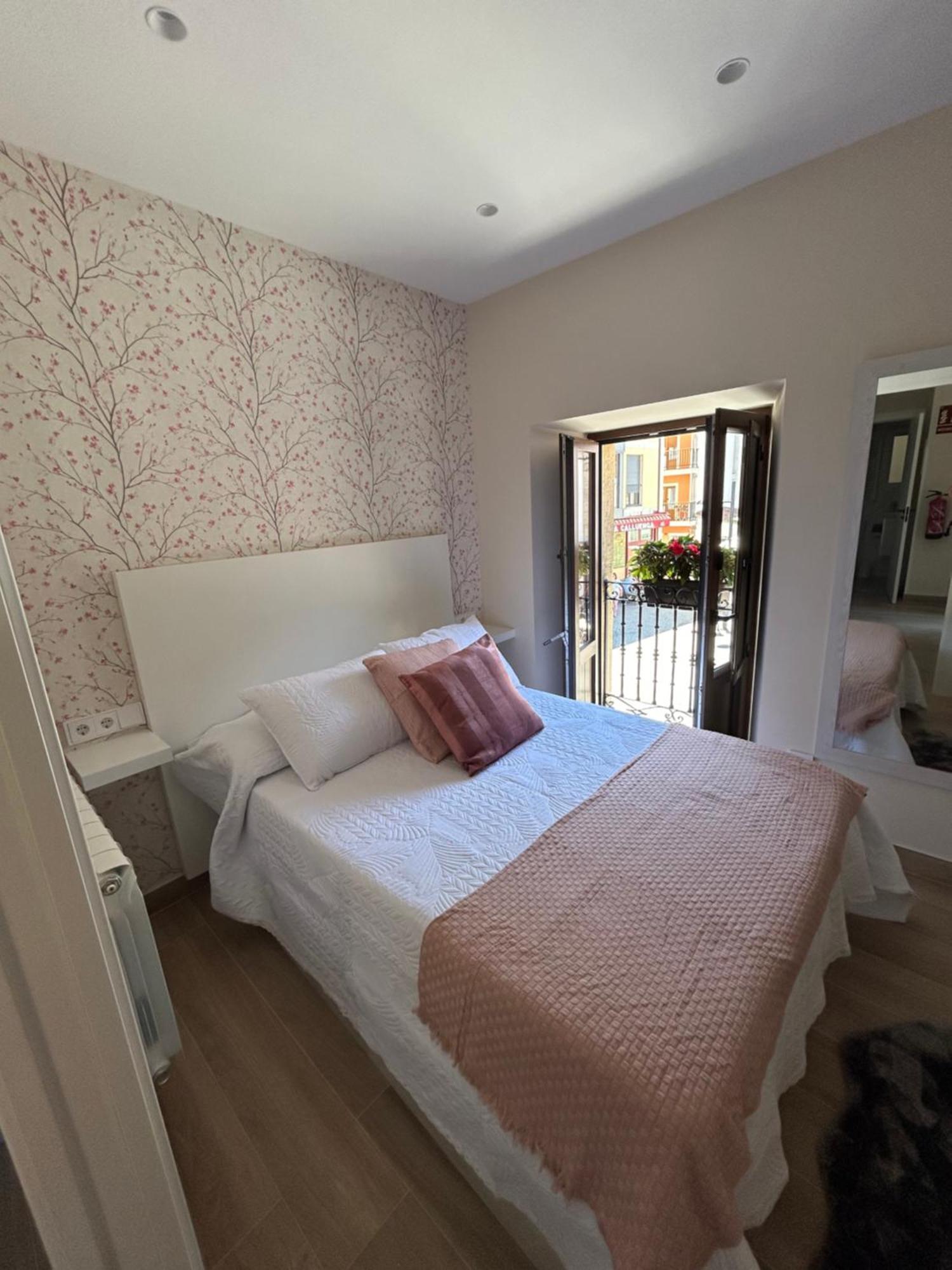 Apartamentos San Roque อาเรนัส เด กาบราเลส ภายนอก รูปภาพ